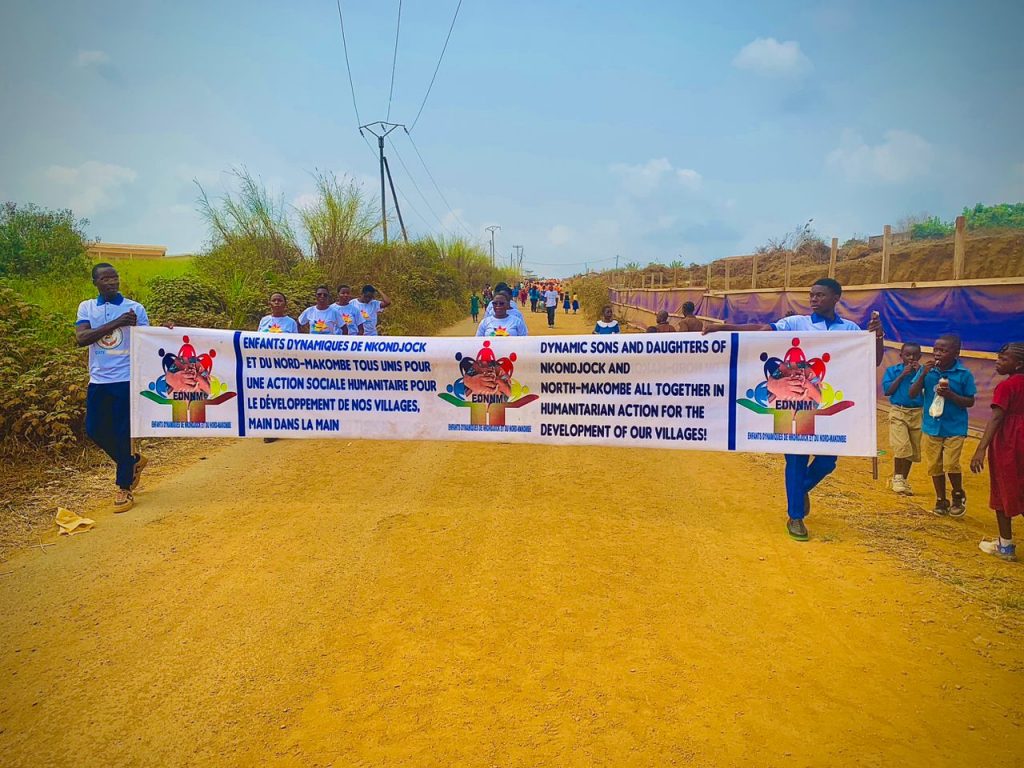 Students Holding the banner for Youth Day