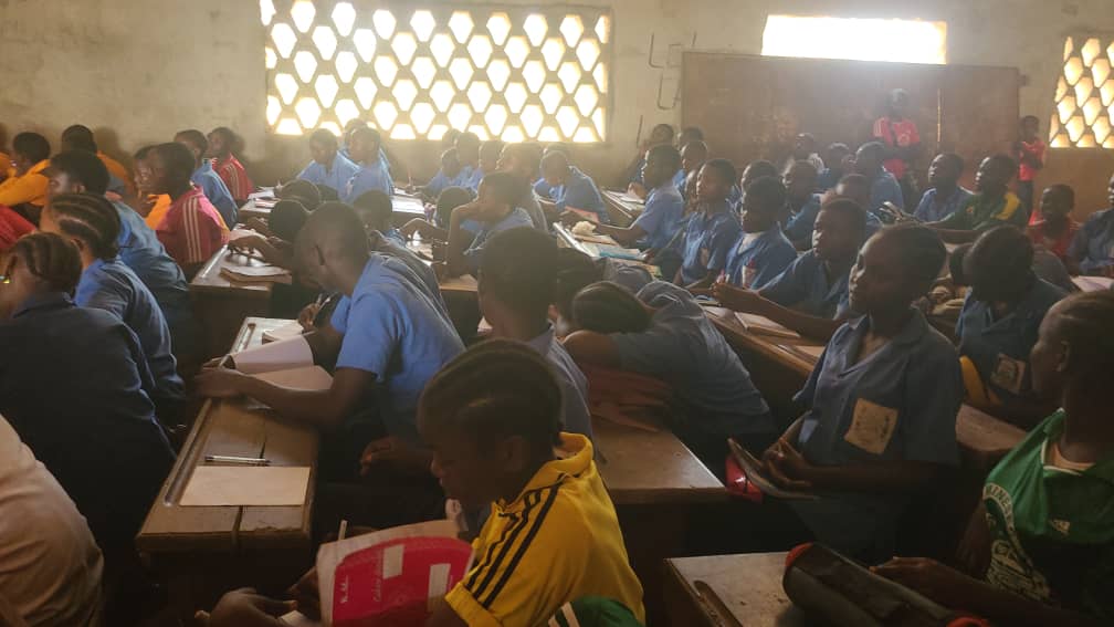 Students in class C Listening to the talk